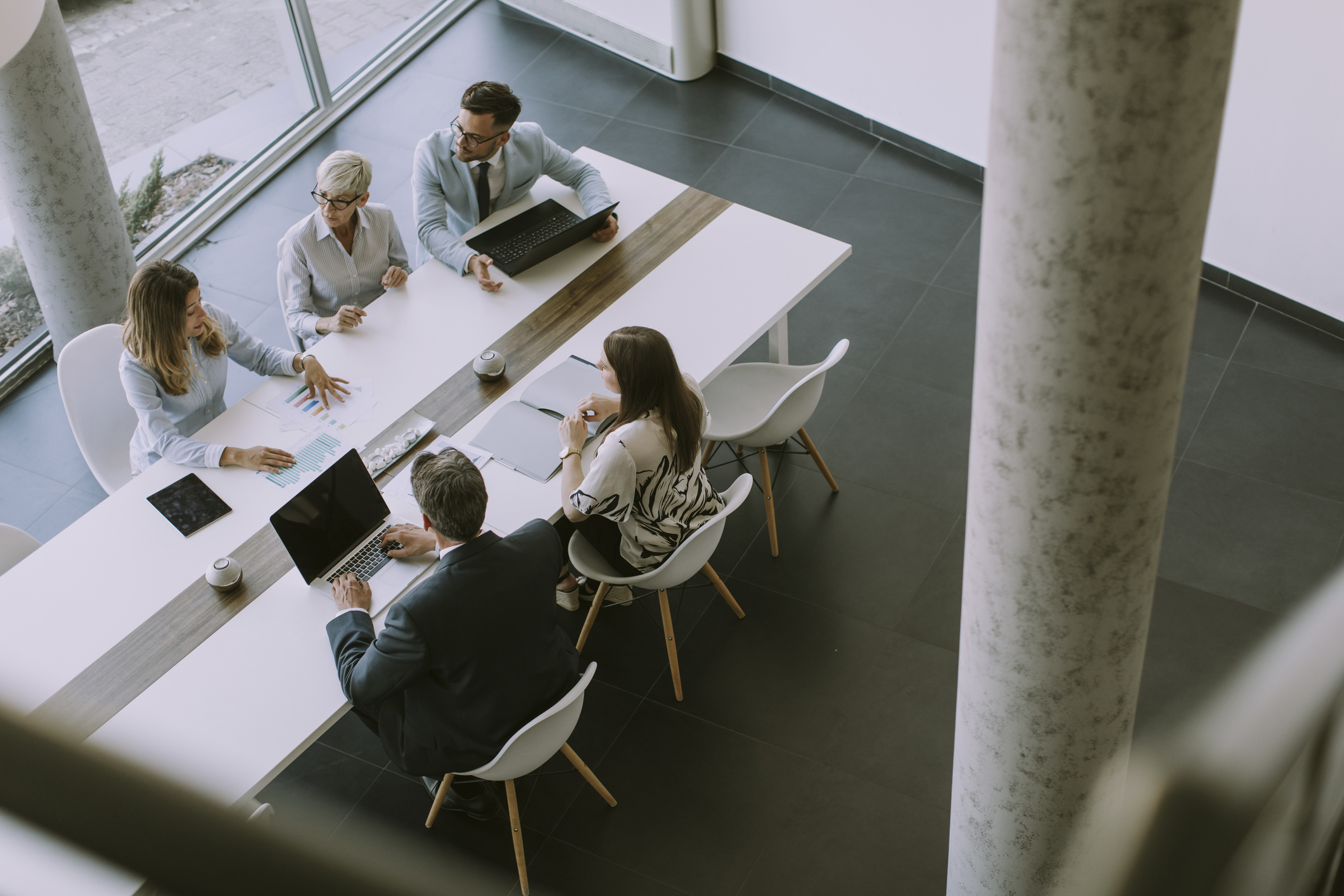 Group of people that is having a meeting